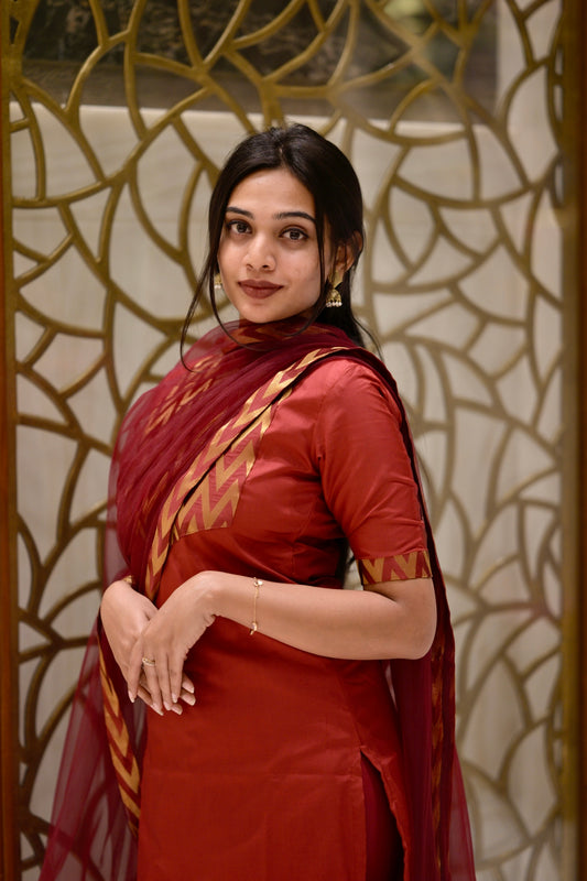 Red silk suit